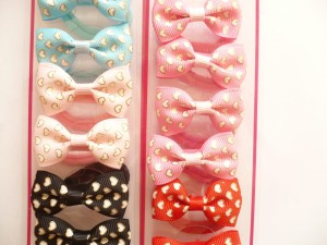 10/118A-0,80 Kokardki na gumce 12 szt.