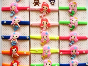 11/028-0,50 Gumki z ozdobą syrenka 12 szt.