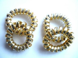 5/247B-0,95 Gumka spiralka złota