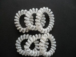 5/238-0,60 Gumka spiralka biało przezroczysta